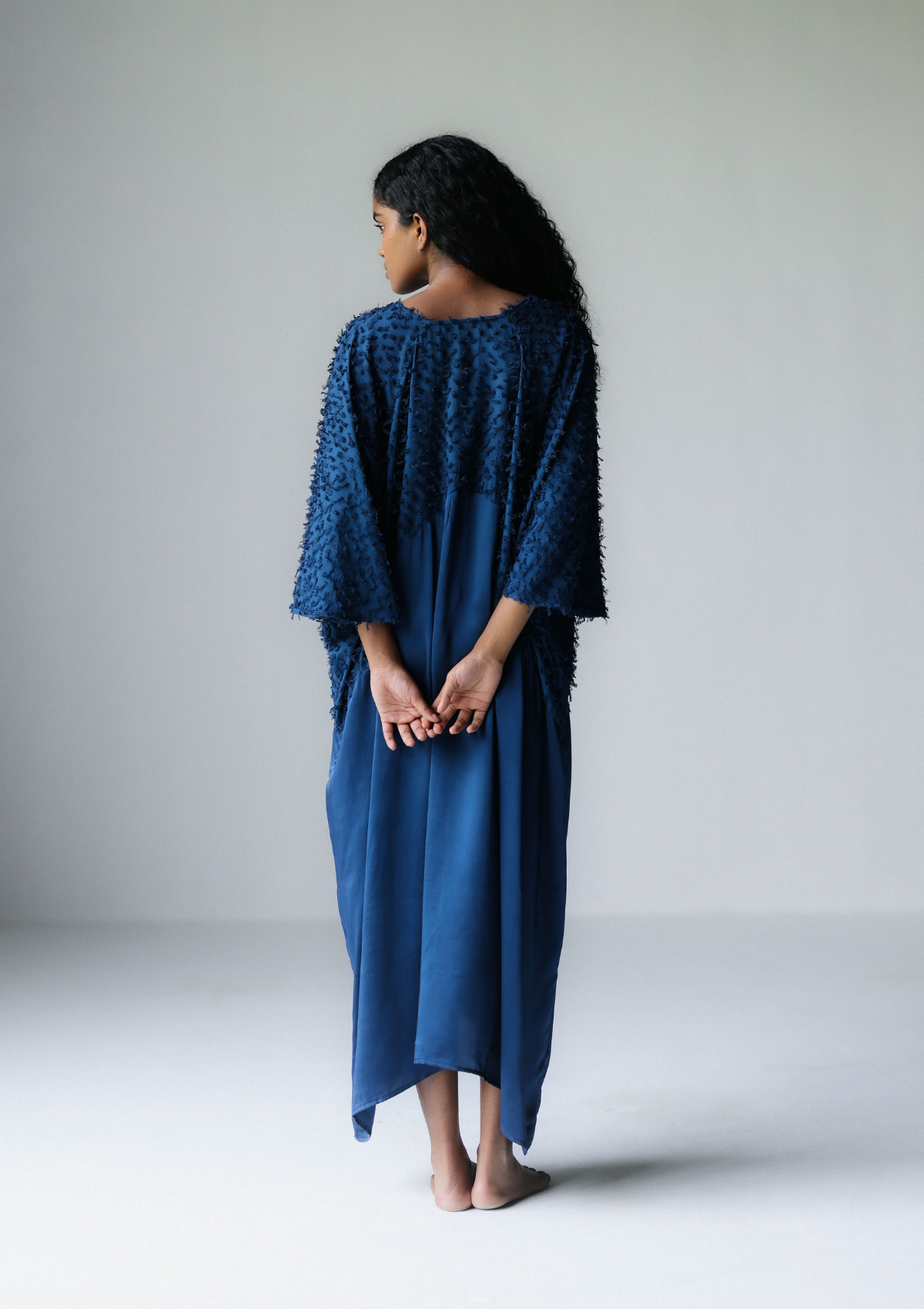 TIRA KAFTAN