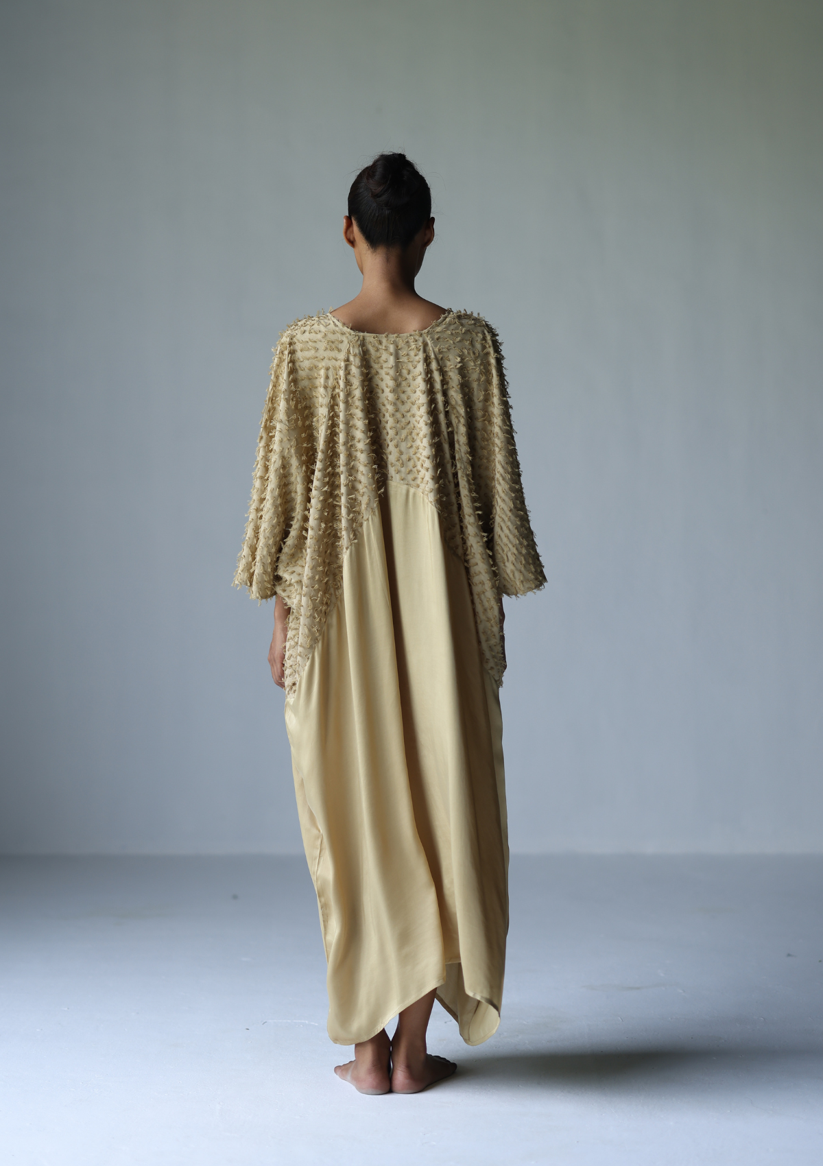 TIRA KAFTAN